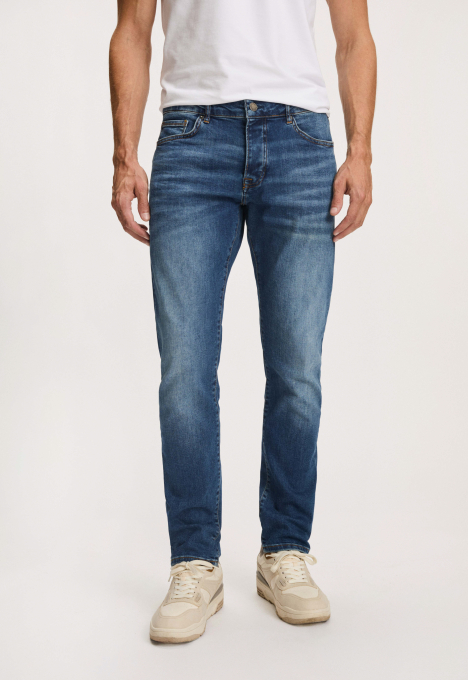 Porter Slim Tapered Jeans