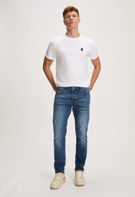Porter Slim Tapered Jeans