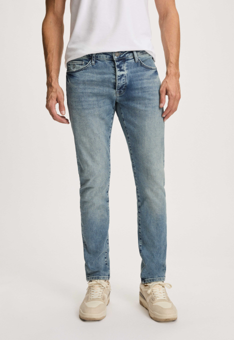 Porter Slim Tapered Jeans