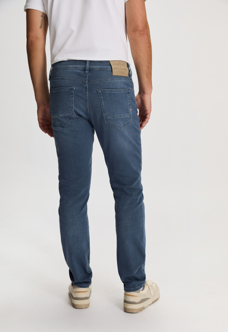 Porter Slim Tapered Jeans