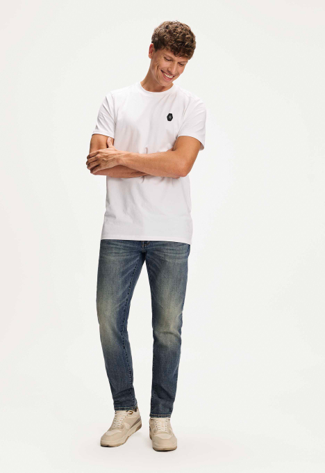 Porter Slim Tapered Jeans
