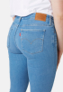 711 Mid Rise Slim Jeans