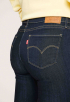 711 Mid Rise Slim Jeans